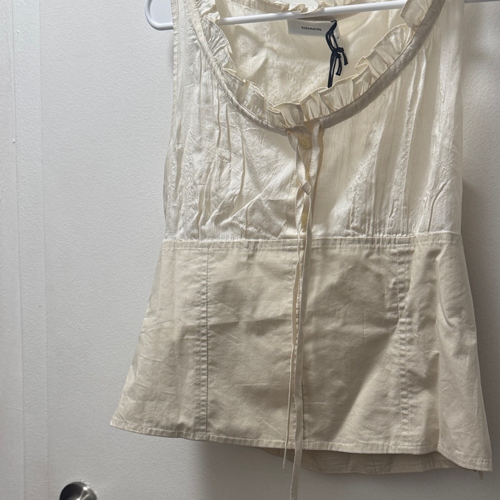 Coach Cream Ruffled Sleeveless Blouse